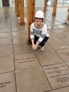 Jamie with the paver she purchased in honor of her parents